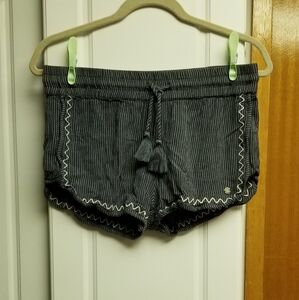 👙Roxy pinstriped shorts with embroidered wave design and front tassels